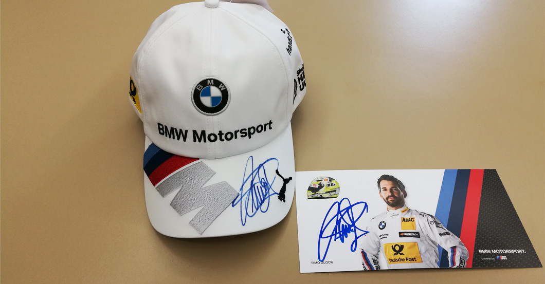 The DTM Driver Timo Glock Signs a BMW Cap